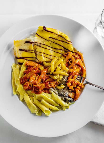 A plate arranged with all of the pasta served at Ai Fiori.