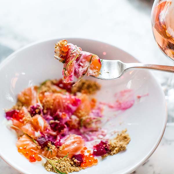 Roe being scooped up by a fork at Le Turtle in Manhattan.